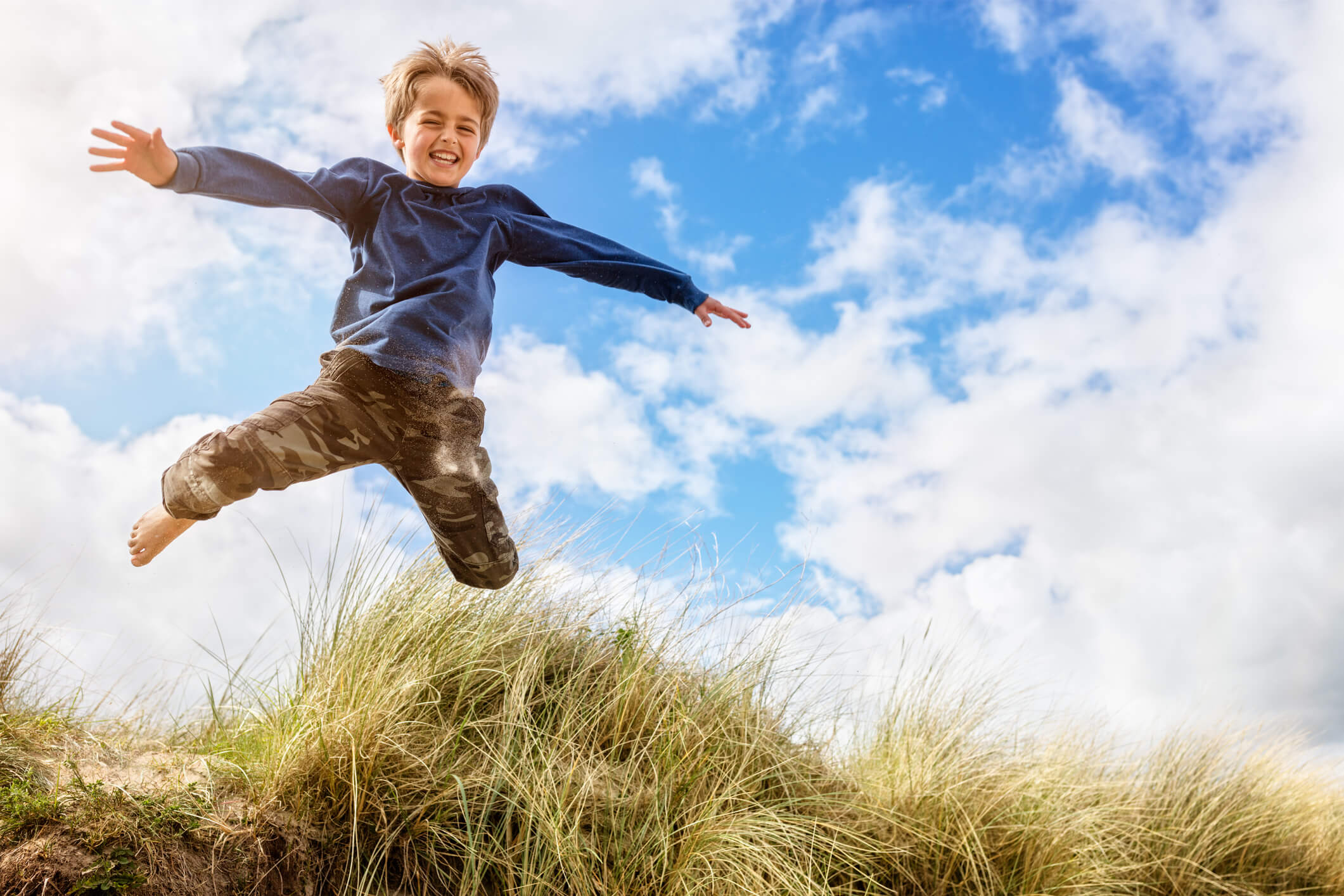 Child Playing in a Field