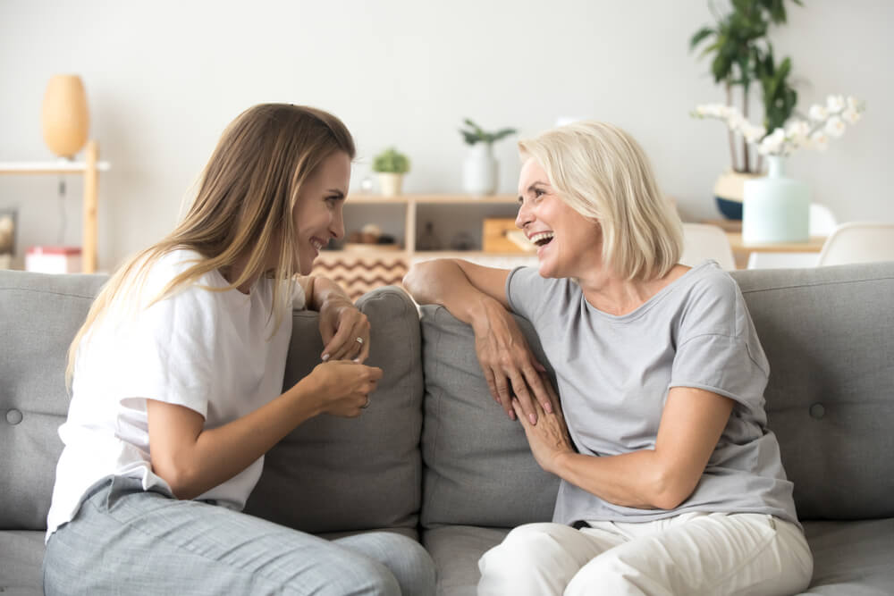 Mother and daughter speaking.