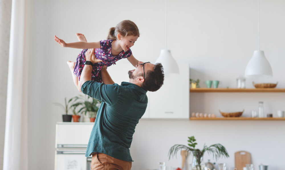 Father and daughter playing.